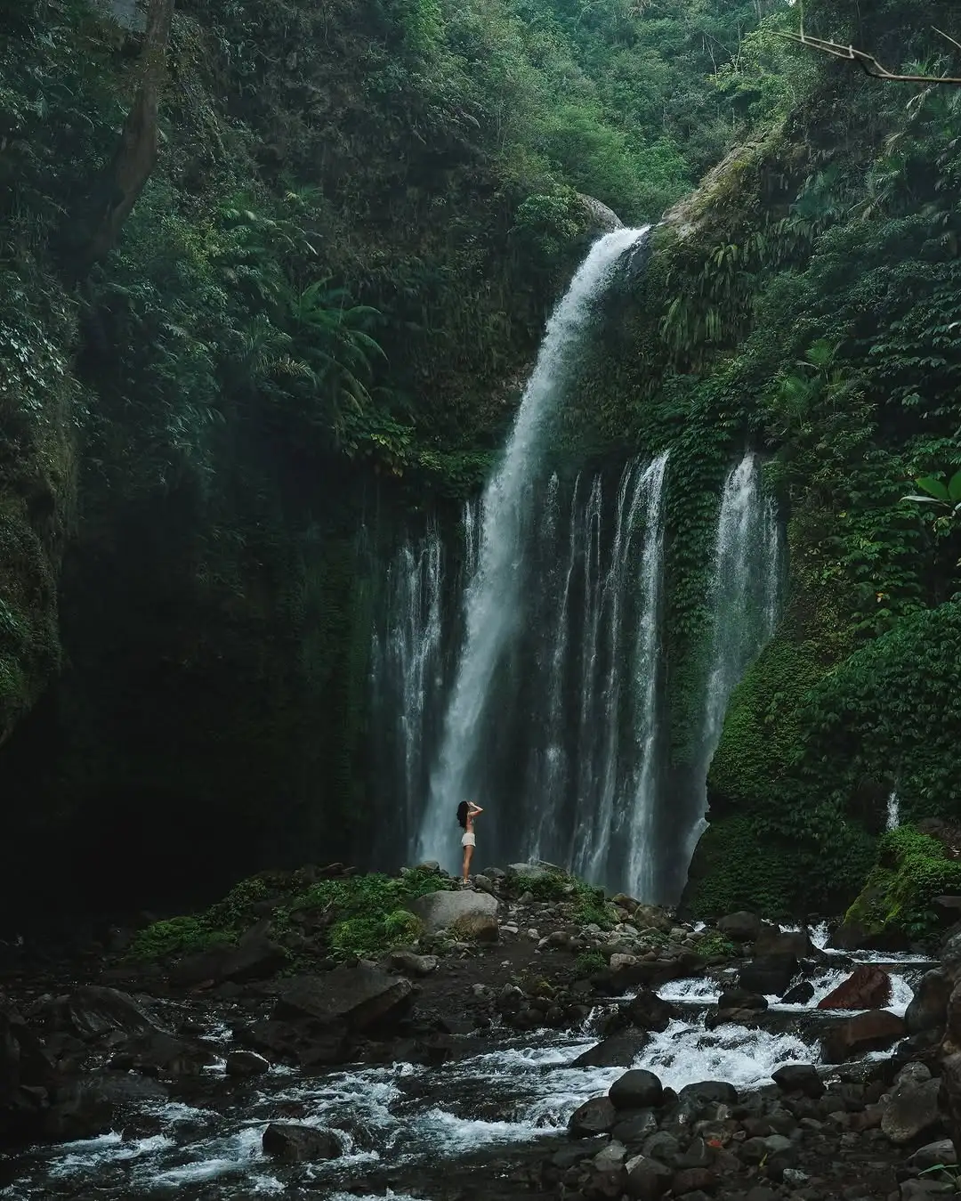 Tiu Kelep Waterfall in Lombok with lush green surroundings