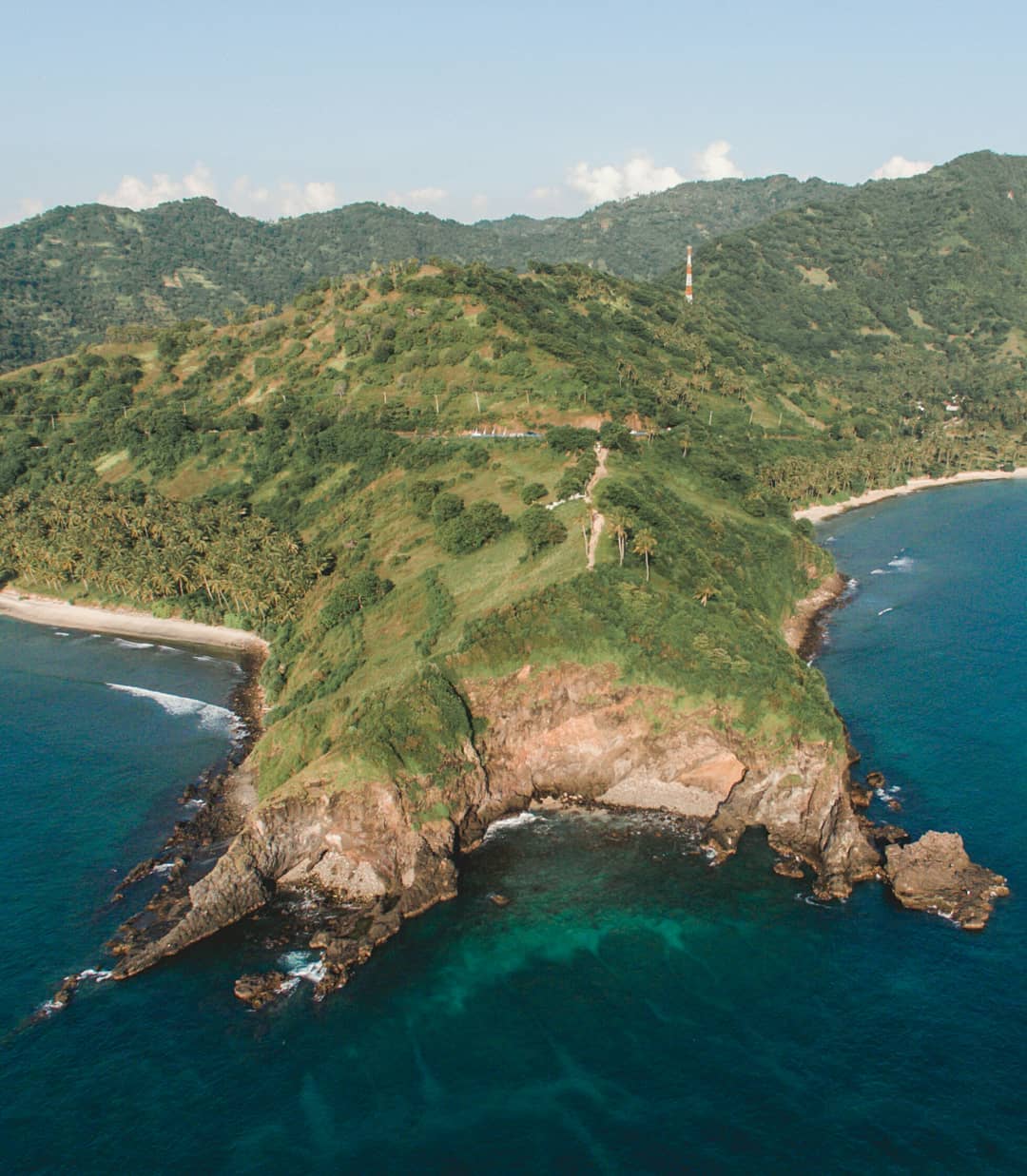 Crystal clear waters with vibrant coral reefs and tropical fish